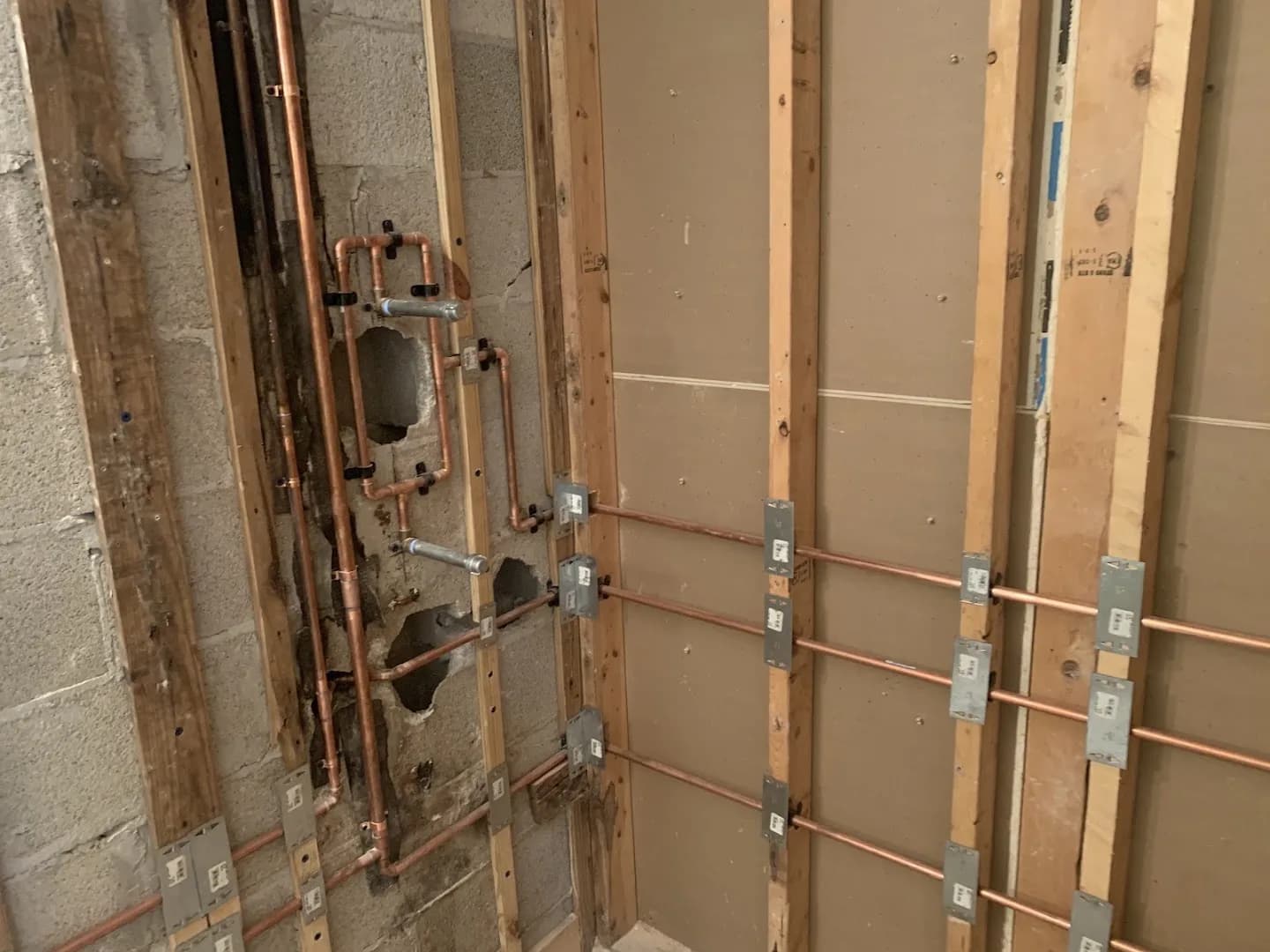 Copper supply rough-in with code-required nail plates
