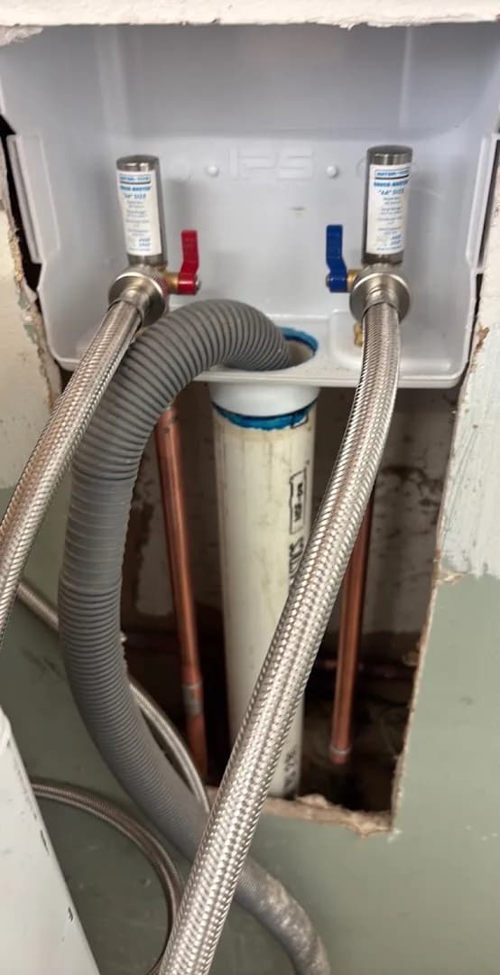 Recessed washing-machine box with shock arrestors and braided supply lines